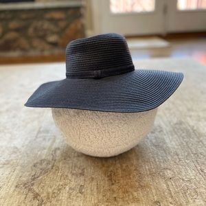 Sand and Shore Wide brimmed sun hat in black.